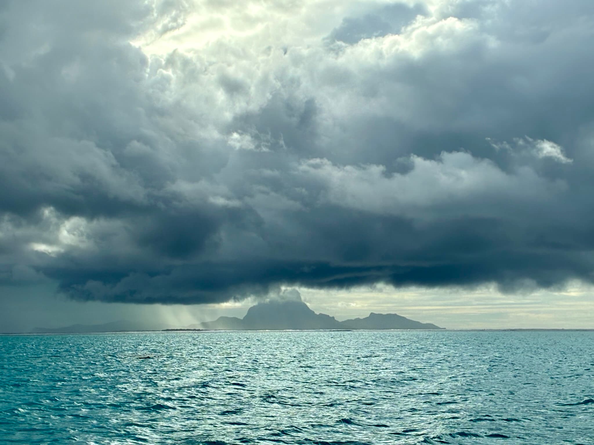 Navigating between the islands of the Society Islands, French Polynesia